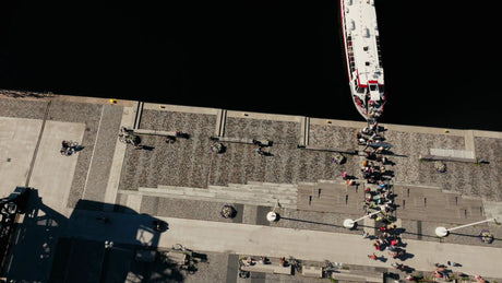 Aerial View of Tour Boat Boarding in Lulea, Sweden, on a Sunny Summer Day