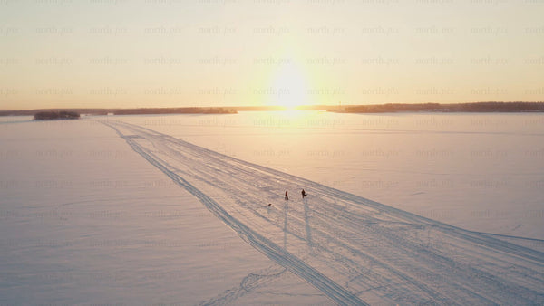 Winter sunset walk on a frozen lake in Luleå