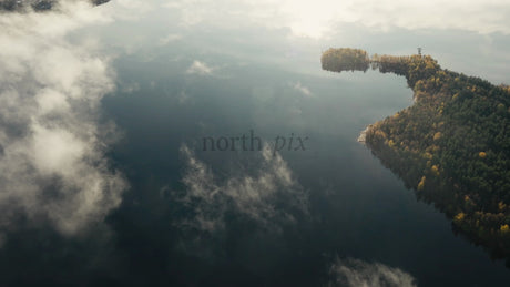 Misty Lake and Autumn Forest at Sunrise: An Aerial View