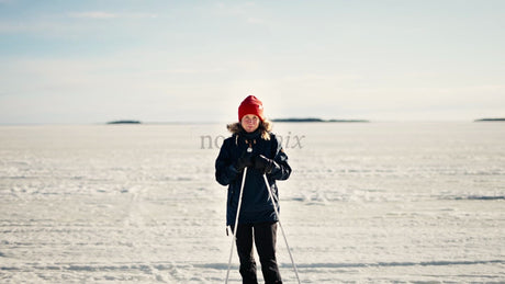 Winter Cross-Country Skiing in Luleå Archipelago, Sweden: Woman Enjoys Scenic Frozen Landscape