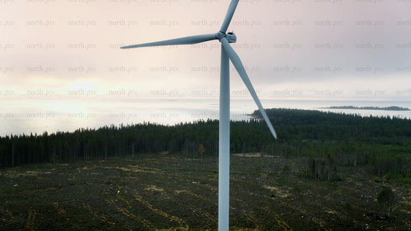 Rotating wind turbine at dawn: Haraholmen. Sustainable energy