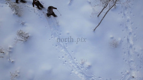 Friends Snowshoeing Through a Winter Wonderland in Gunnarsbyn